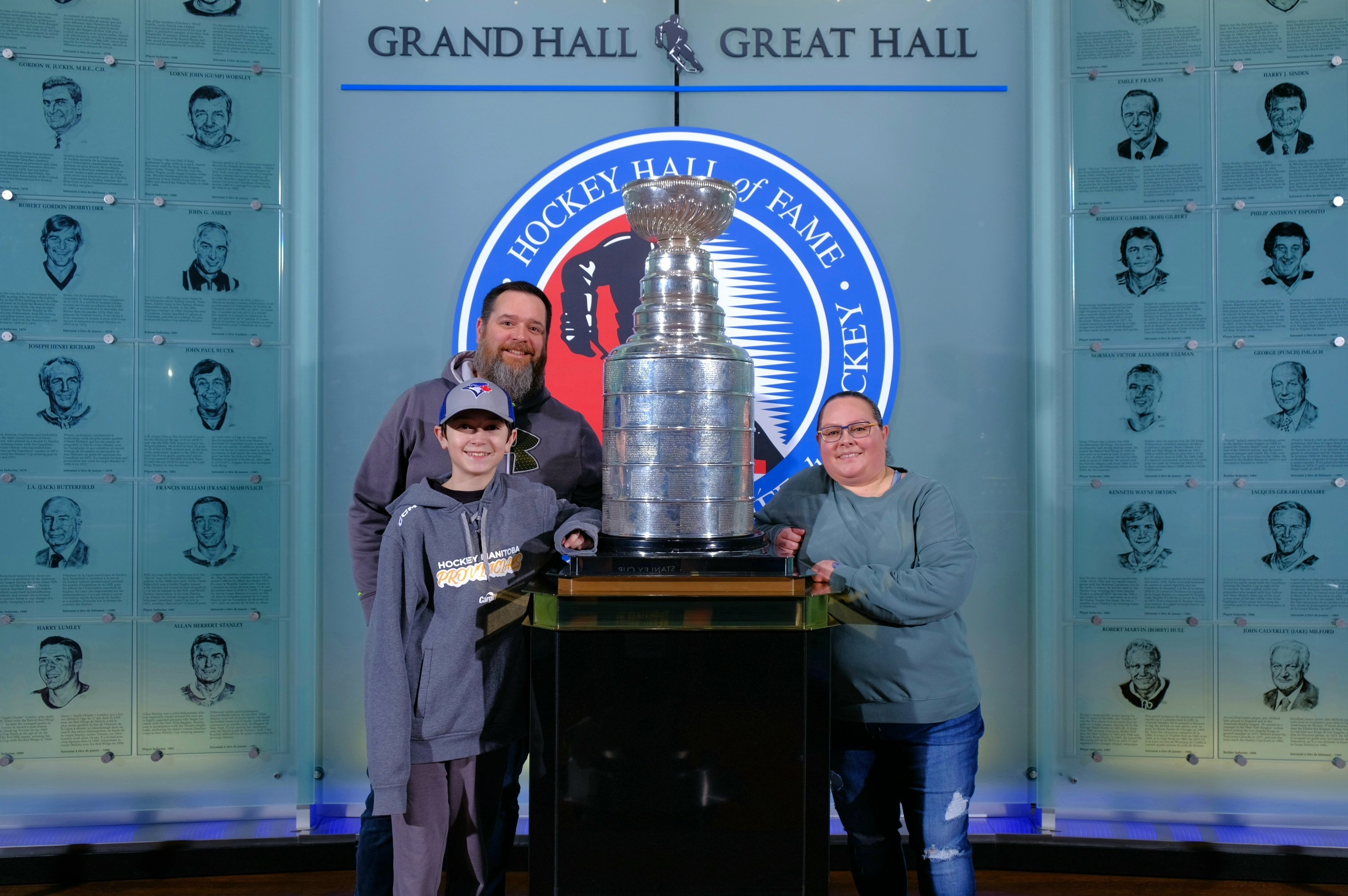 Andrew Victor and family pose at the Hockey Hall of Fame