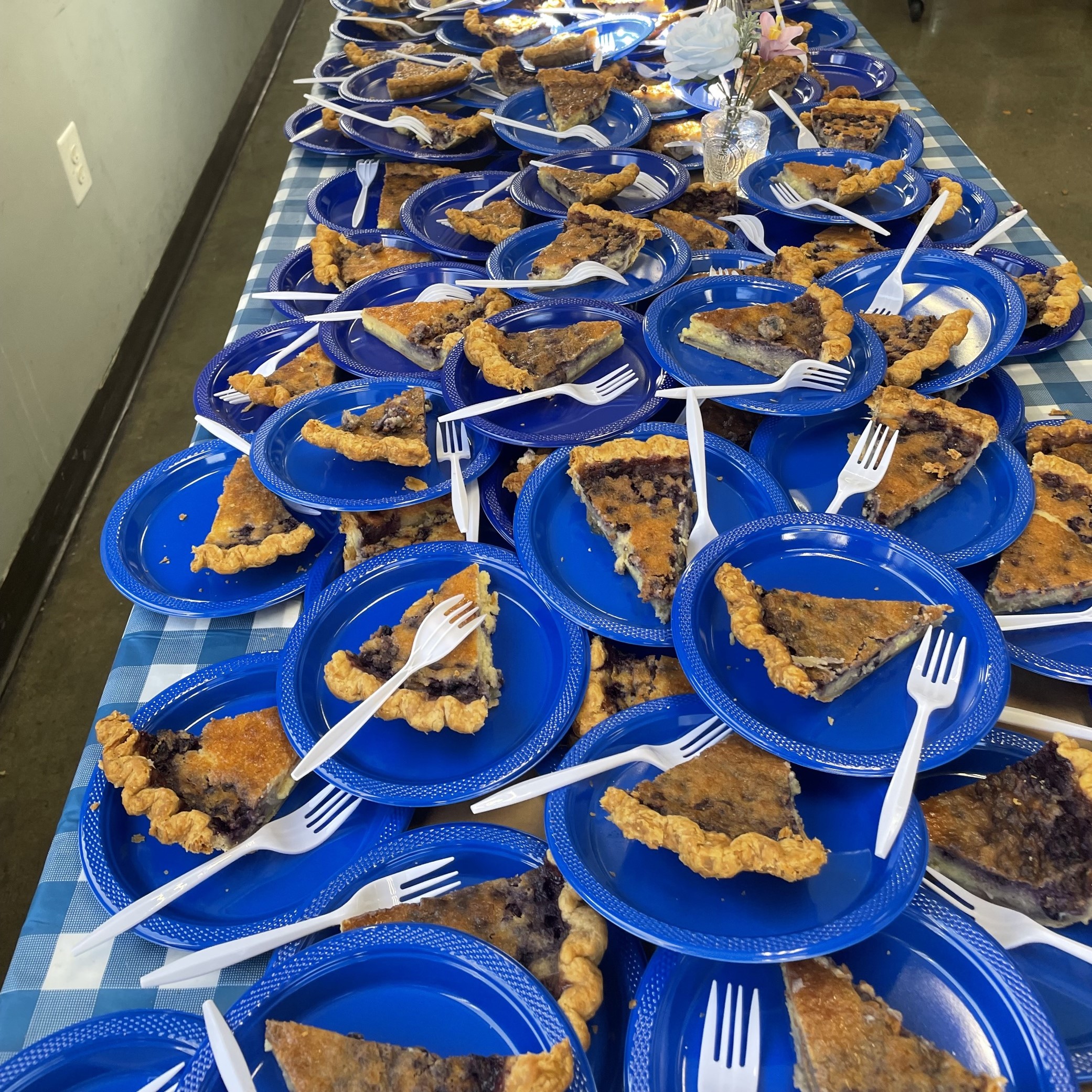Plates of blueberry pie