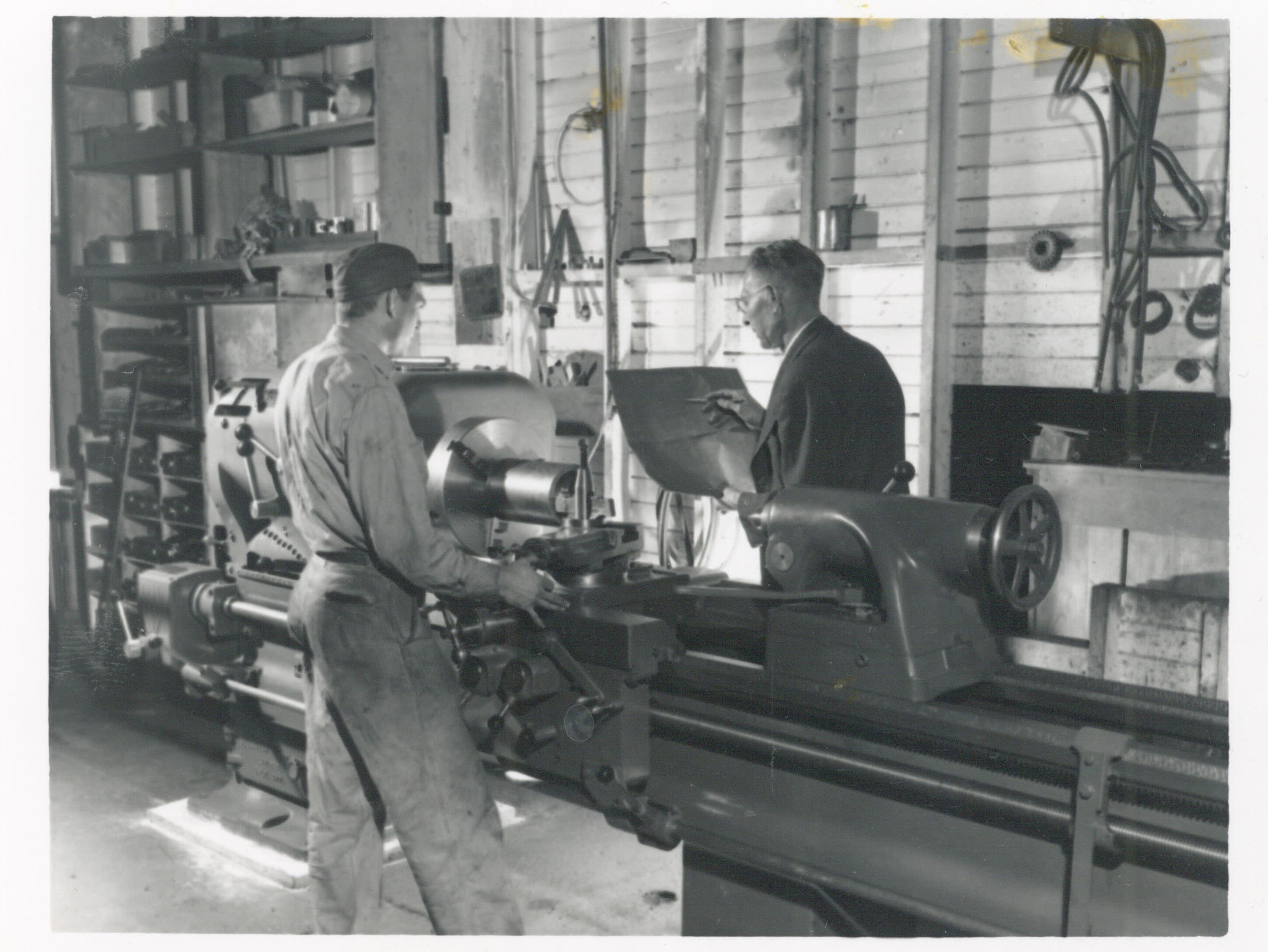 Two team members in Price Winnipeg plant in the 1960s