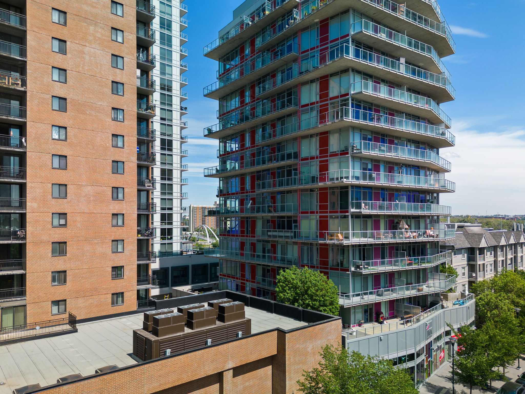 The building in question with custom enclosure surrounded by other buildings