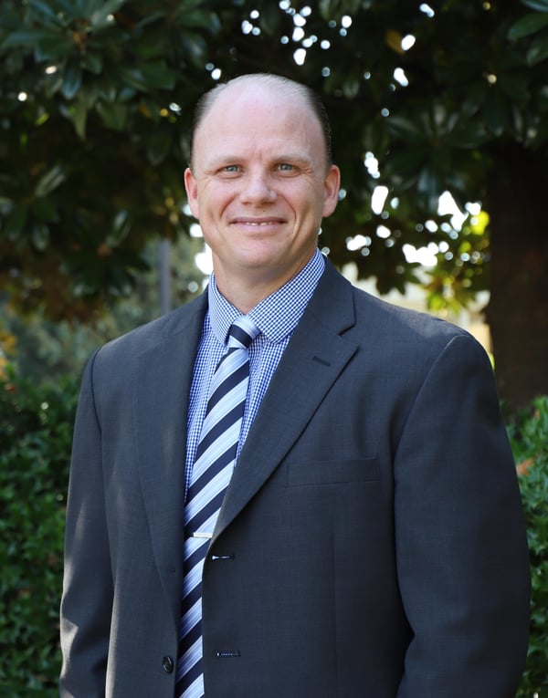 Jeff Rogers posing outdoors in Suwanee, GA