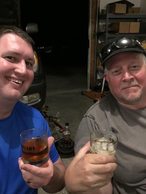 Todd and father-in-law, Patrick, holding drinking glasses