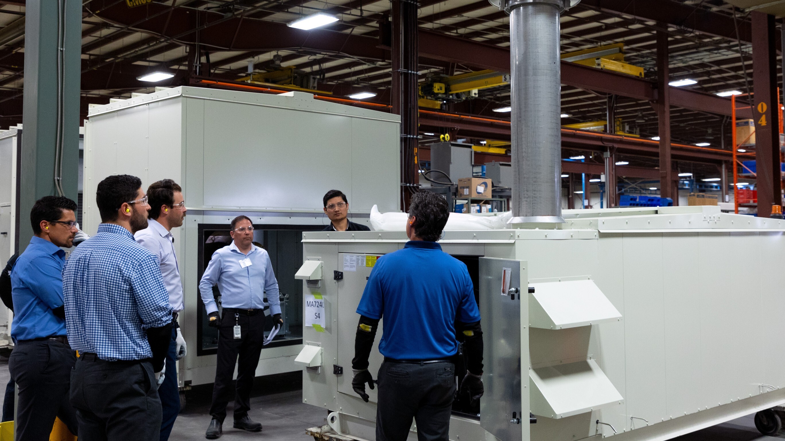 JP and team tour visitors around the SolutionAir factory