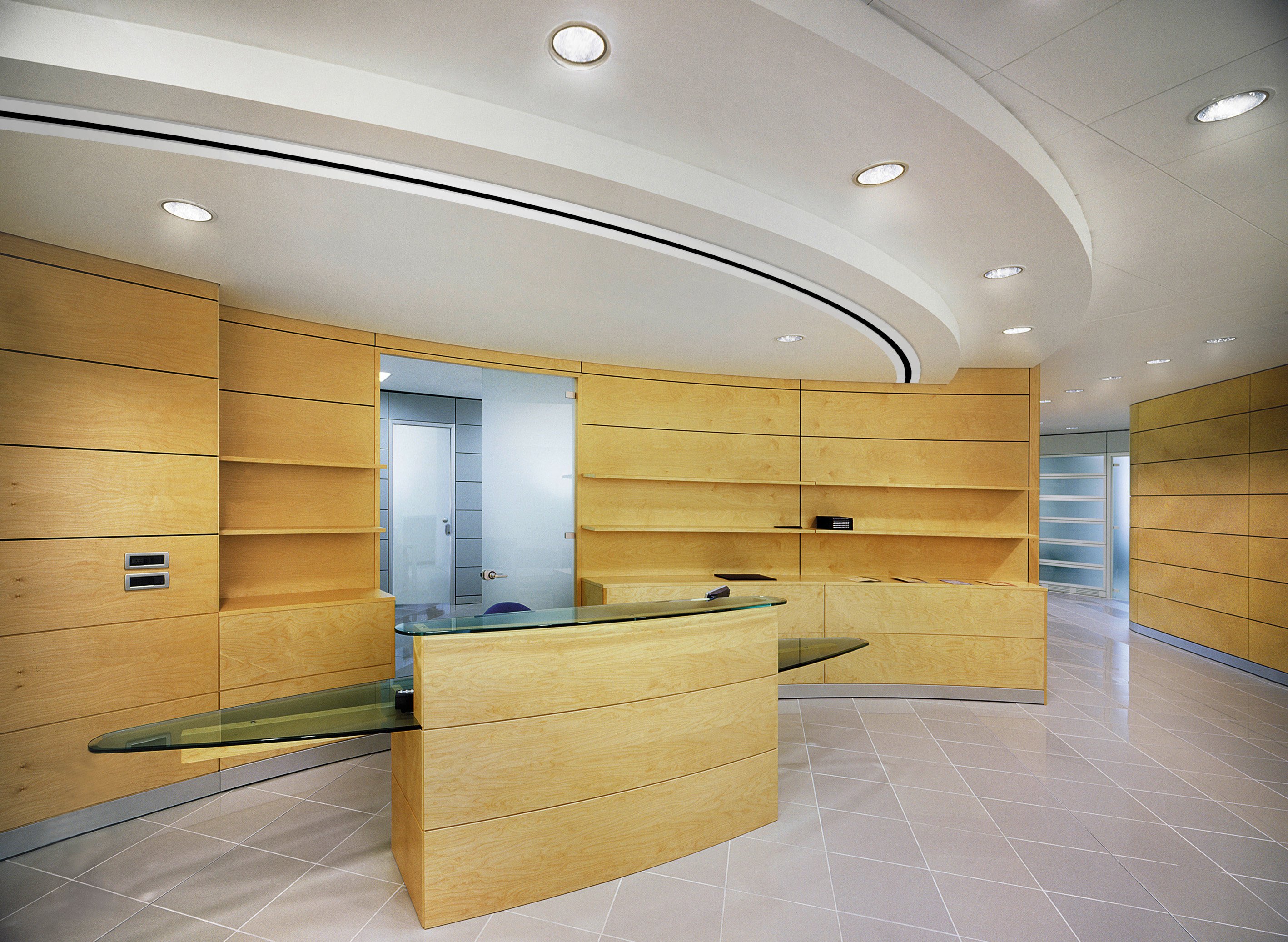 CF Custom Flow slot diffuser with an EF exposed-frame border installed in the bulkhead above a reception desk