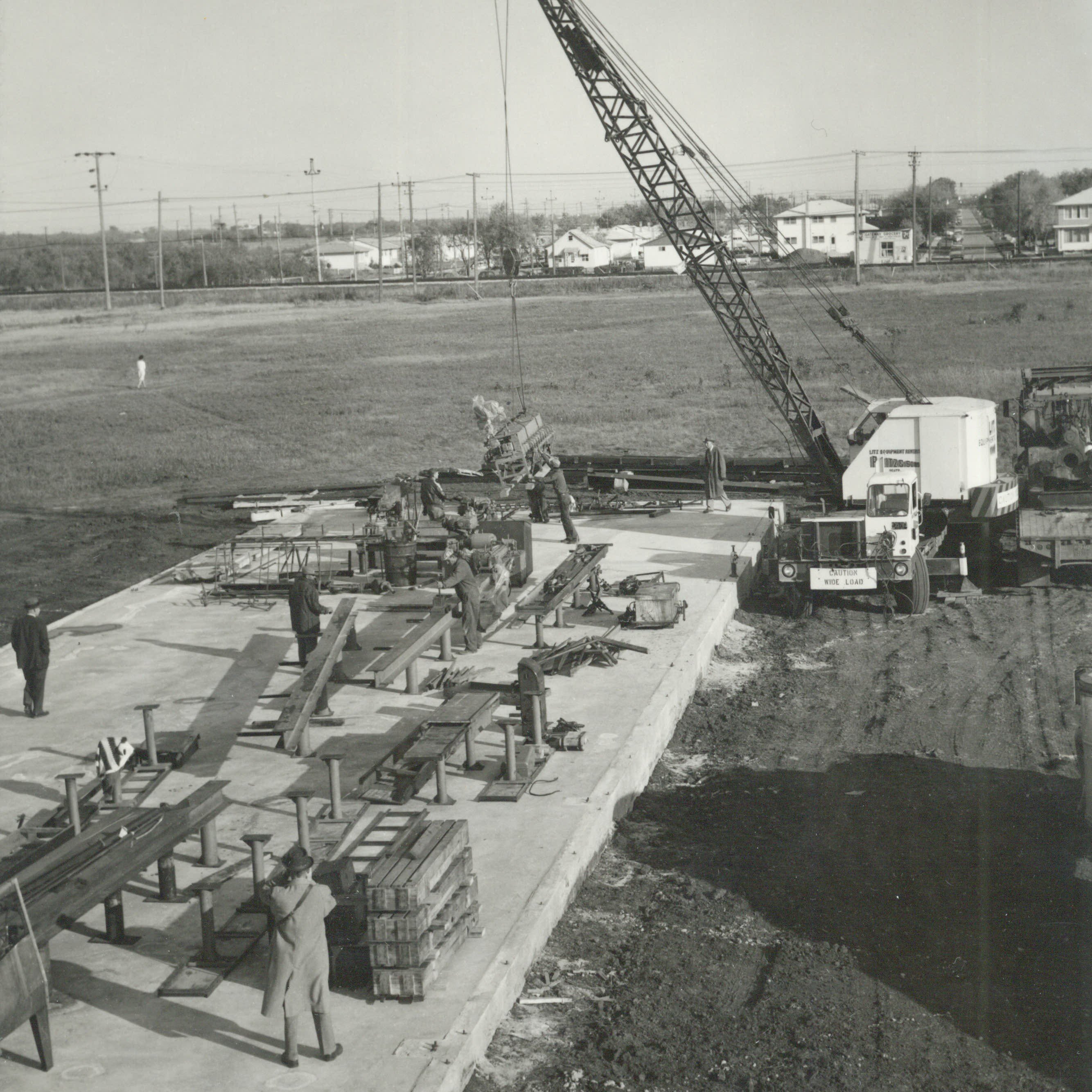 Construction site with foundation and crane