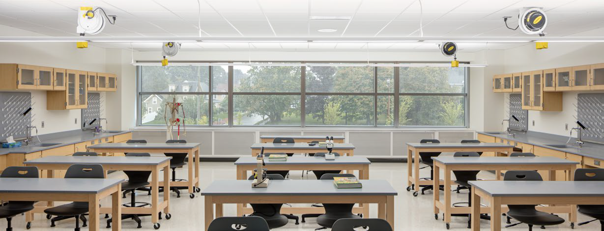 Active Chilled Beam Cabinets retrofitted to the perimeter of a classroom